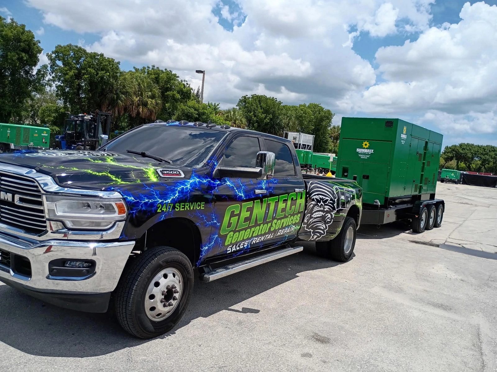 GenTech service truck towing a generator to a delivery